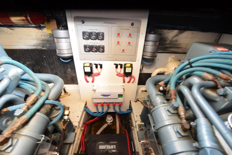 Slide: The Image of Engine room of 1991 Baron 43-E with control panel and wiring. - 33