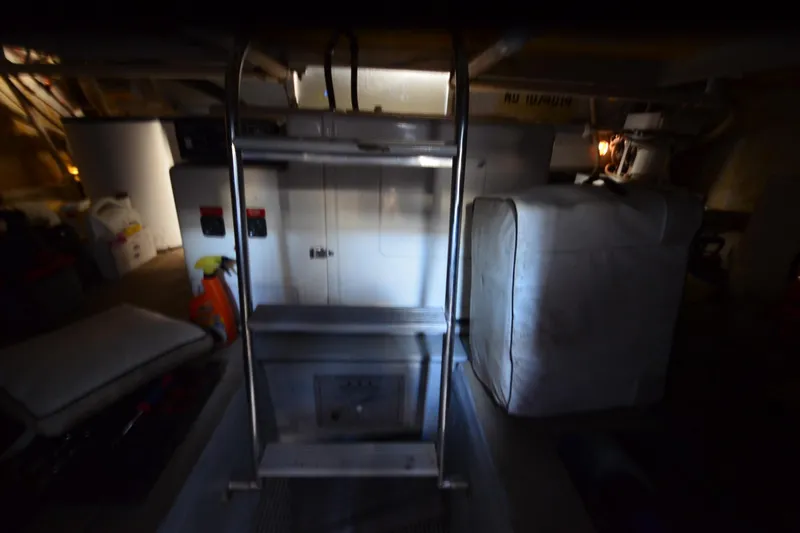 Slide: The Image of Interior of a 1991 Baron 43-E boat with storage and equipment. - 34