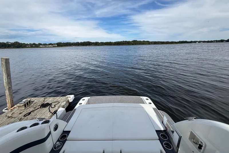 Slide: The Image of 2017 Formula 37 Performance Cruiser with Raymarine radar on deck, near water. - 17
