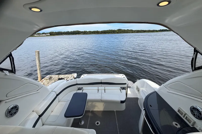 Slide: The Image of 2017 Formula 37 Performance Cruiser on calm water, showcasing sleek design and spacious deck. - 18