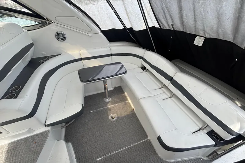 Slide: The Image of 2017 Formula 37 Performance Cruiser on calm water, showcasing sleek design and spacious deck. - 20