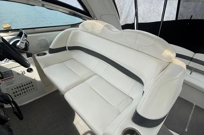 Slide: The Image of 2017 Formula 37 Performance Cruiser interior with sleek seating and modern design on open water. - 22