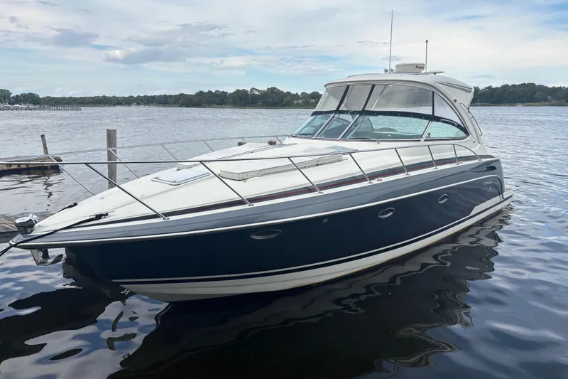 Slide: The Image of 2017 Formula 37 Performance Cruiser interior with beige leather seating and porthole window. - 45