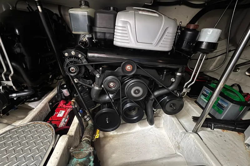 Slide: The Image of Engine compartment of a 2017 Formula 37 Performance Cruiser with visible components and batteries. - 53