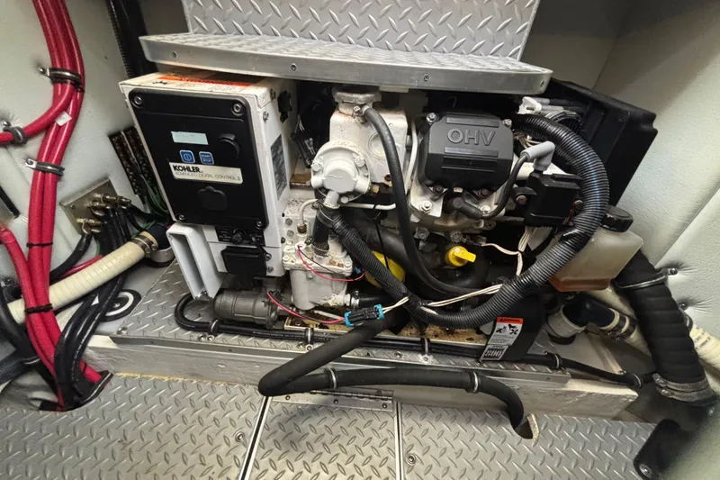 Slide: The Image of Engine compartment of a 2017 Formula 37 Performance Cruiser with Kohler generator. - 54