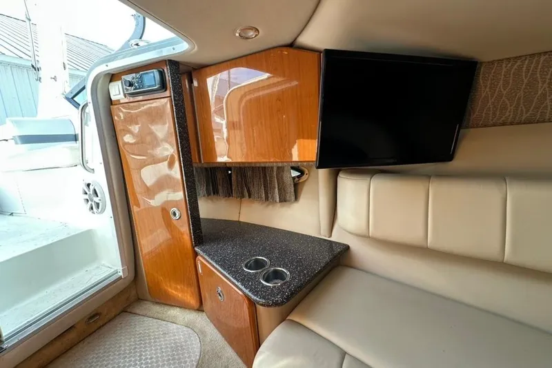 Slide: The Image of Interior of 2005 Formula 280 Sun Sport boat with wood cabinetry and seating. - 13