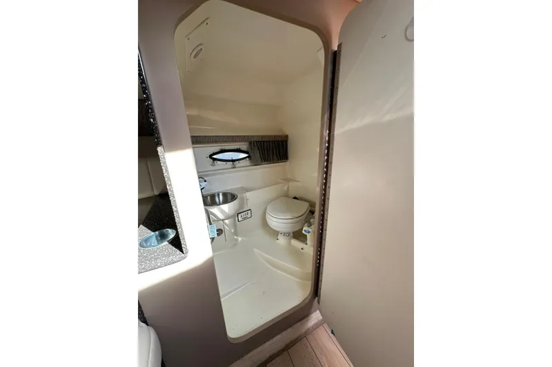 Slide: The Image of 2005 Formula 280 Sun Sport boat bathroom with sink and toilet. - 16