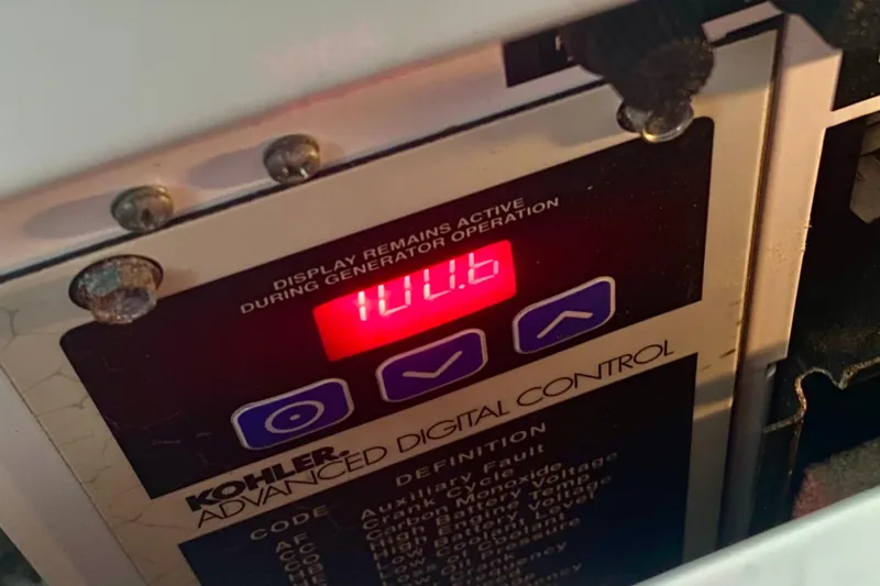 Slide: The Image of Kohler advanced digital control panel on 2007 Sea Ray 38 Sundancer boat. - 32