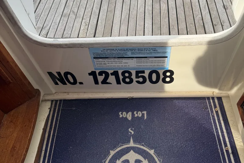 Slide: The Image of Boat registration number 1218508 on Gemini 105Mc, 2008 model, with nautical-themed mat. - 14