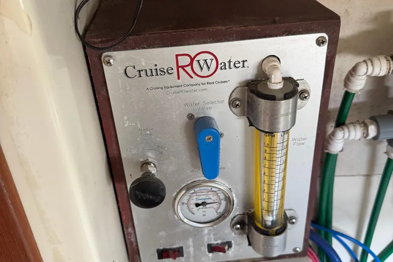 Slide: The Image of Cruise RO Water system on a 2008 Gemini 105Mc boat, featuring flow meter and controls. - 27