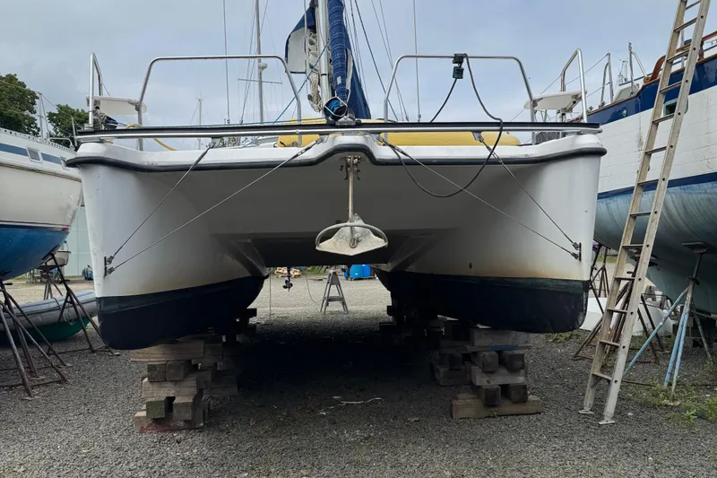 Slide: The Image of 2008 Gemini 105Mc catamaran on blocks in a boatyard, ready for maintenance. - 3