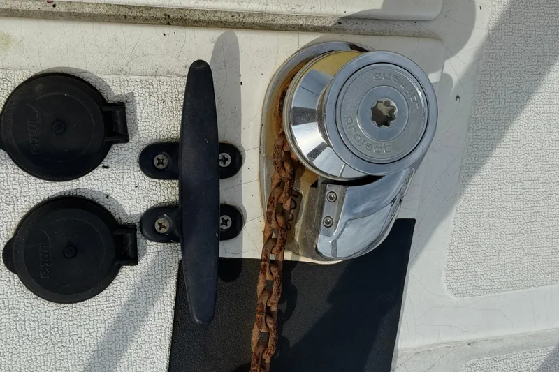 Slide: The Image of Boat deck with winch, cleat, and chain on a 2008 Gemini 105Mc. - 9