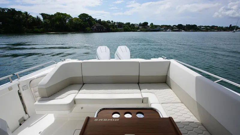 Slide: The Image of Luxurious 2025 Nimbus Weekender 11 #60 boat interior with scenic water view. - 18