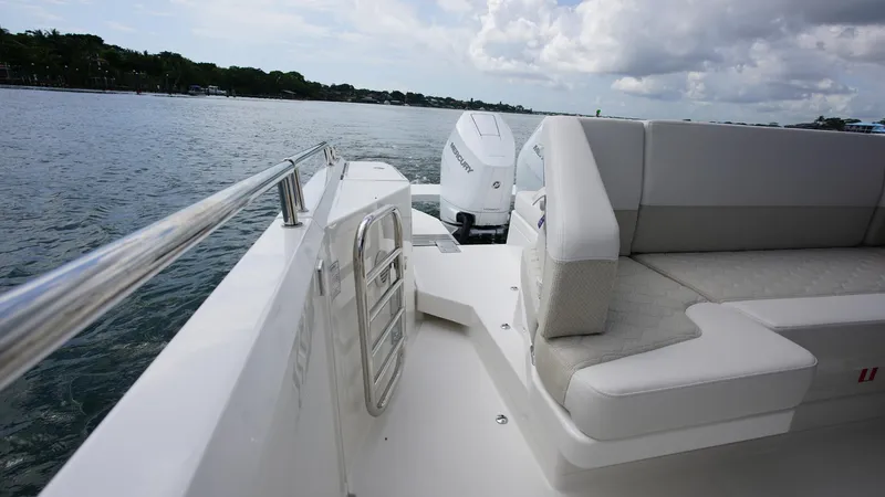 Slide: The Image of Nimbus Weekender 11 #60, 2025 model, featuring sleek seating and modern design on open water. - 20