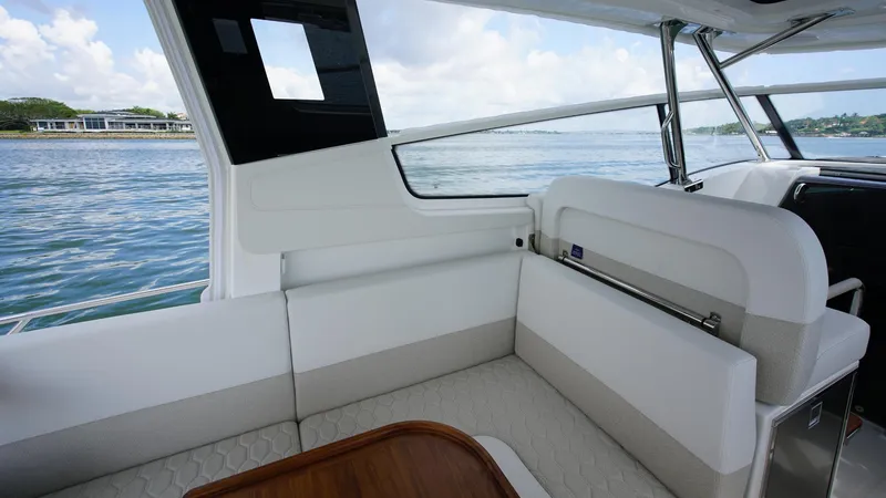 Slide: The Image of Luxurious interior of 2025 Nimbus Weekender 11 #60 yacht with scenic water view. - 10