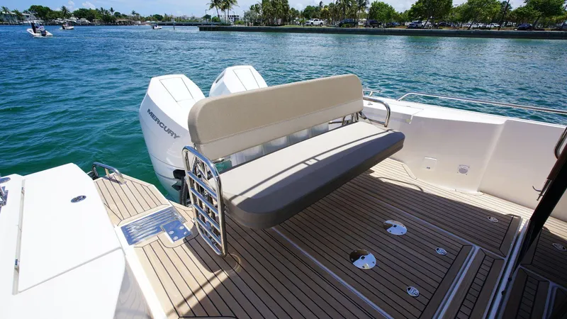 Slide: The Image of Nimbus Commuter 11 #082 2024 boat with Mercury outboard engines and spacious deck. - 4