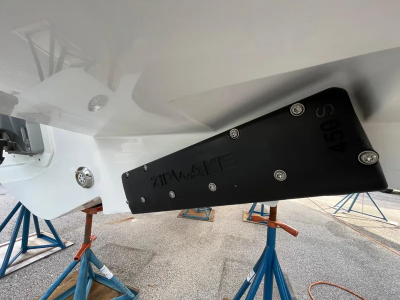 Slide: The Image of 2024 Nimbus Commuter 9 #136 boat with Zipwake 450S trim tab. - 6