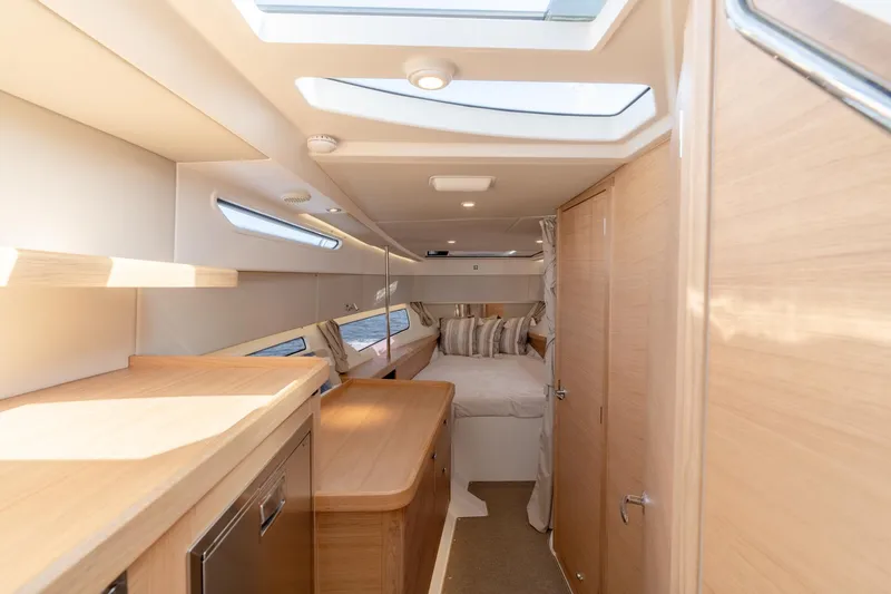 Slide: The Image of Interior of 2024 Nimbus Weekender 11 #20 yacht with modern wood finish. - 18