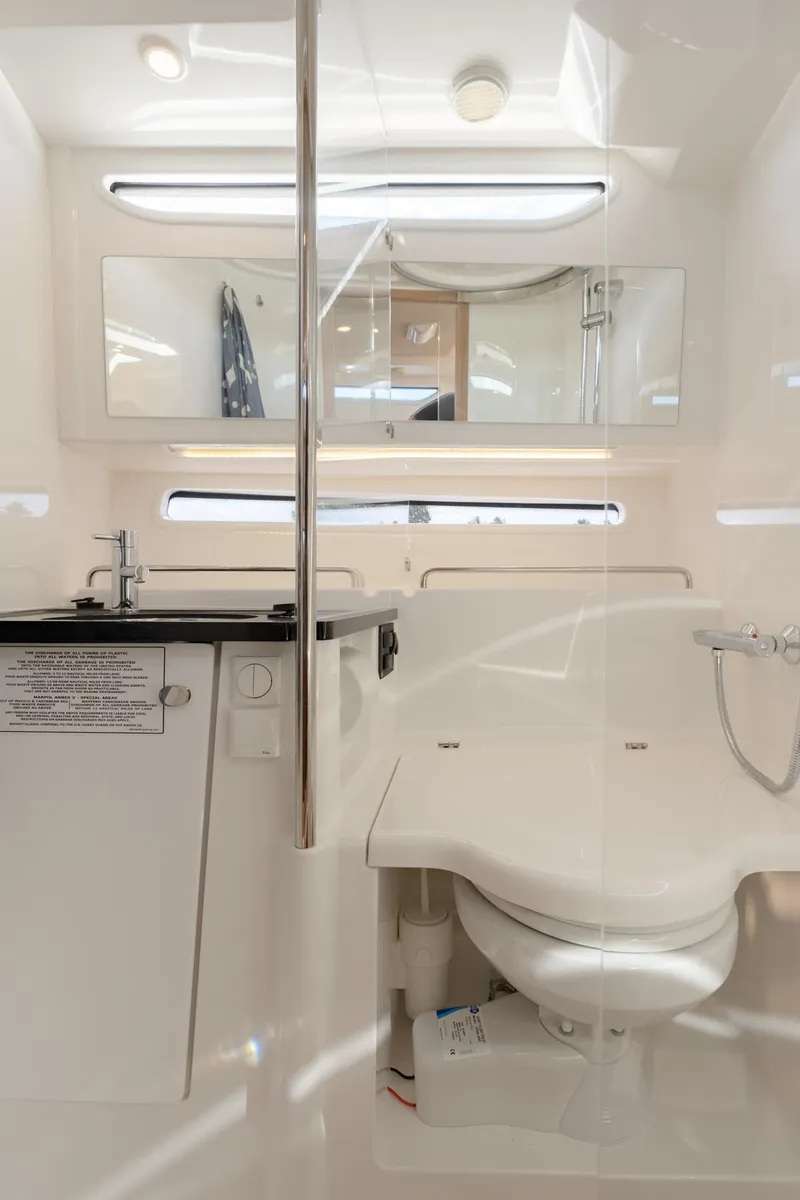 Slide: The Image of Modern bathroom in 2024 Nimbus Weekender 11 #20 boat with sleek fixtures. - 19