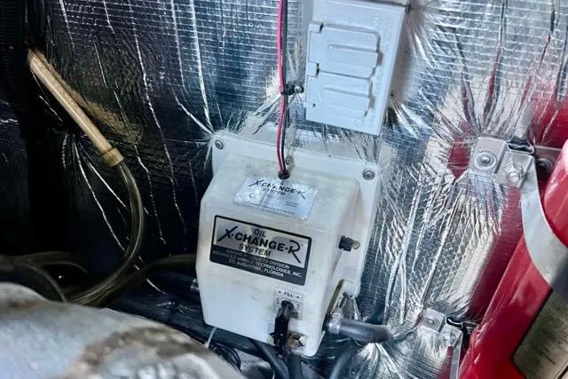 Slide: The Image of Oil change system in 2003 Cruisers Yachts 3772 Express engine room. - 31