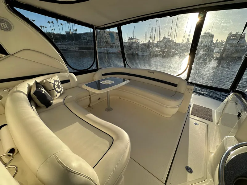 Slide: The Image of Luxurious interior of 2005 Sea Ray 420 Sundancer yacht with marina view. - 18
