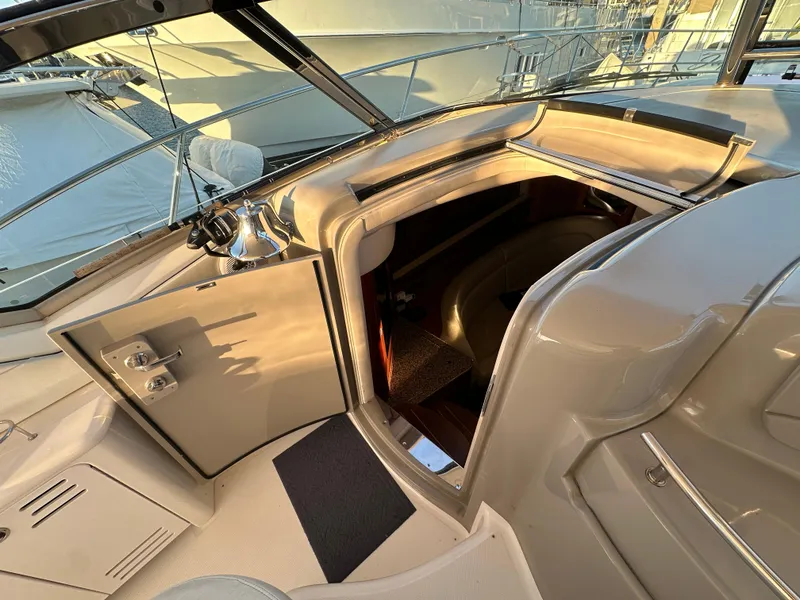 Slide: The Image of 2005 Sea Ray 420 Sundancer yacht interior with open cabin door. - 29