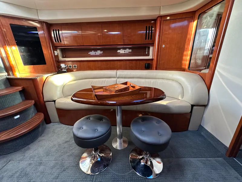 Slide: The Image of Luxurious 2005 Sea Ray 420 Sundancer yacht interior with elegant seating and modern decor. - 38