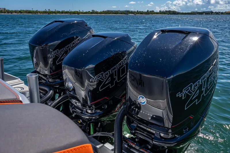 Slide: The Image of Triple Mercury Racing 400 outboard engines on a 2012 Yellowfin 39 Offshore boat. - 16
