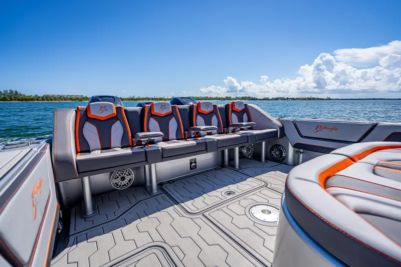 Slide: The Image of 2012 Yellowfin 39 boat interior with stylish seating and ocean view. - 39