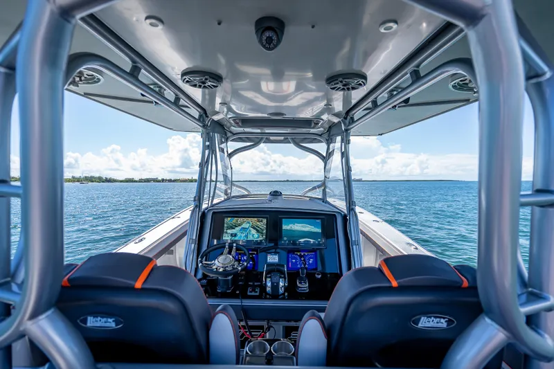 Slide: The Image of Interior view of 2012 Yellowfin 39 boat with advanced navigation system on open water. - 42