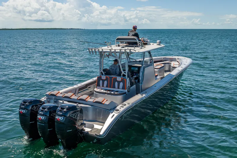 Slide: The Image of 2012 Yellowfin 39 boat with triple 400 engines on open water. - 68