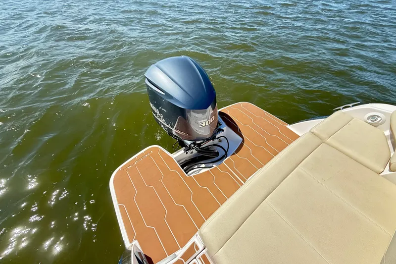 Slide: The Image of 2019 Regal 26 OBX boat with Yamaha 300 outboard motor on water. - 15