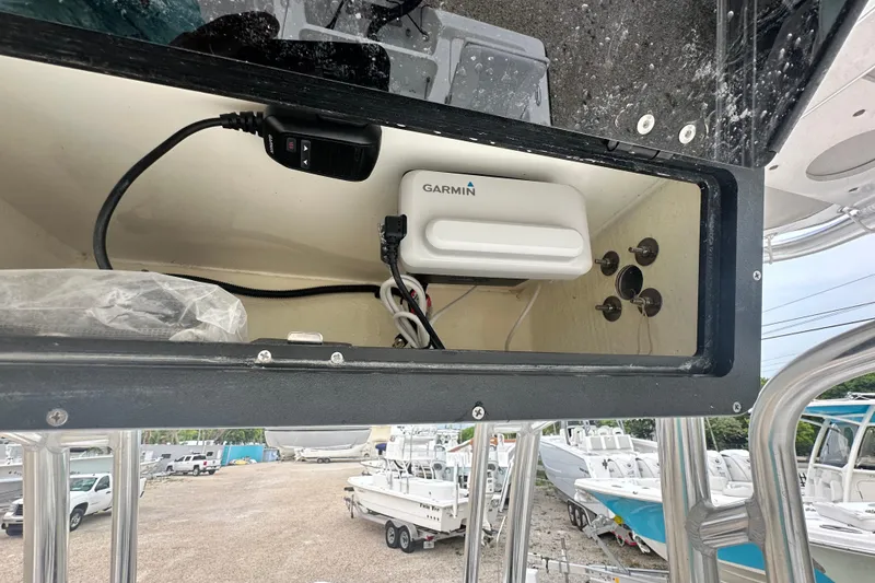 Slide: The Image of Interior view of a 2026 Key West 210 Bay Reef boat with Garmin electronics. - 12