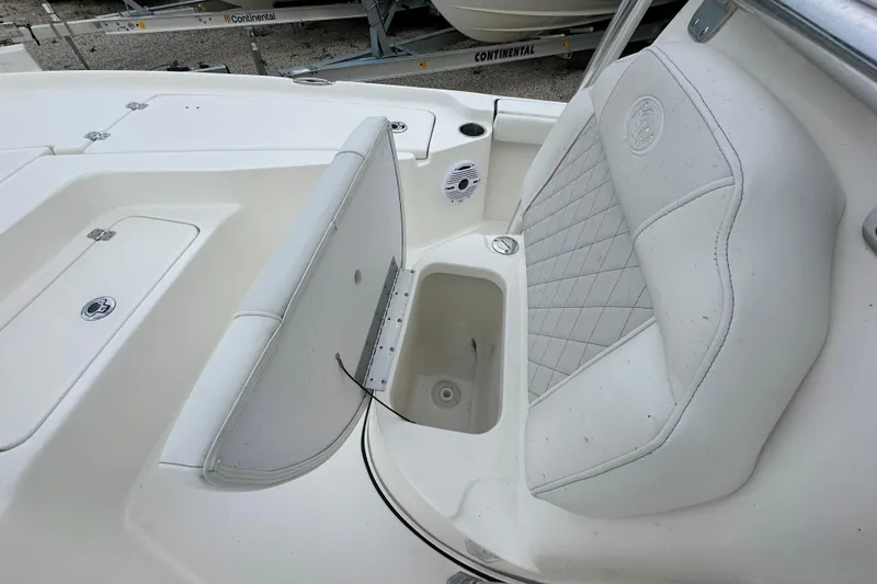 Slide: The Image of 2026 Key West 210 Bay Reef boat seat with storage compartment open. - 14