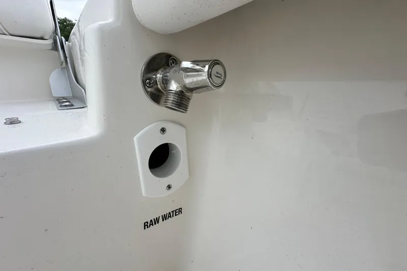 Slide: The Image of 2026 Key West 210 Bay Reef boat raw water outlet detail. - 18