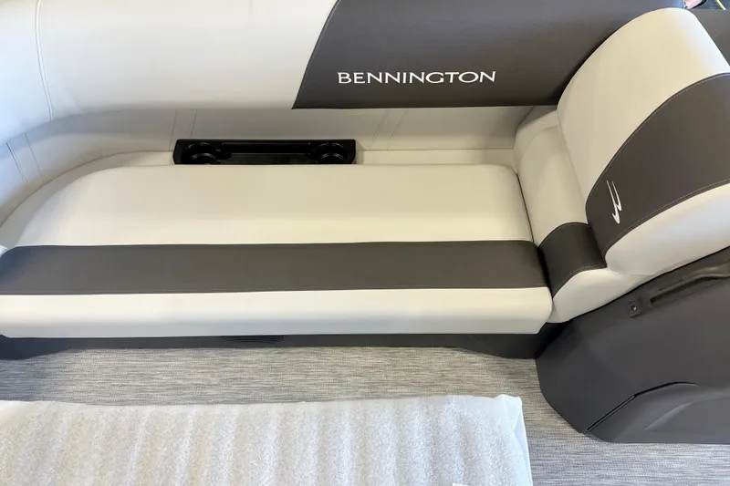 Slide: The Image of 2026 Bennington 22 S1 Stern Radius boat seat, featuring sleek gray and white upholstery. - 3