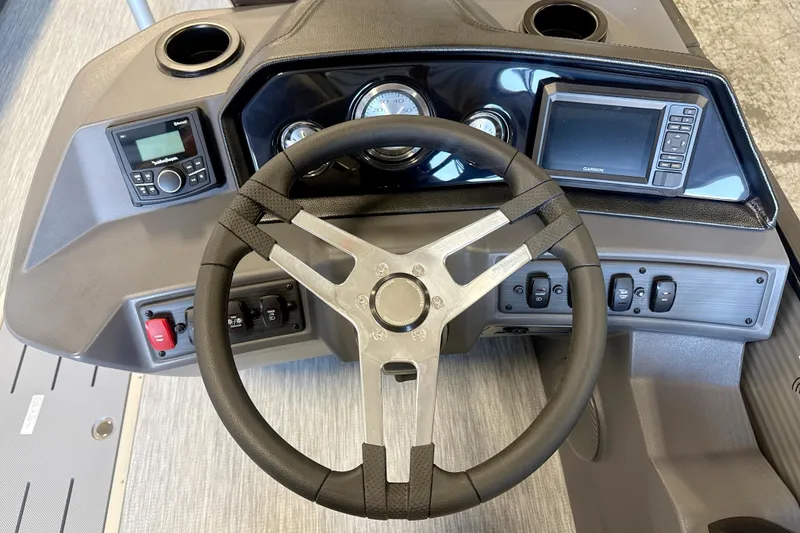 Slide: The Image of Dashboard of 2026 Bennington S1 22 Stern Radius with steering wheel and control panel. - 6