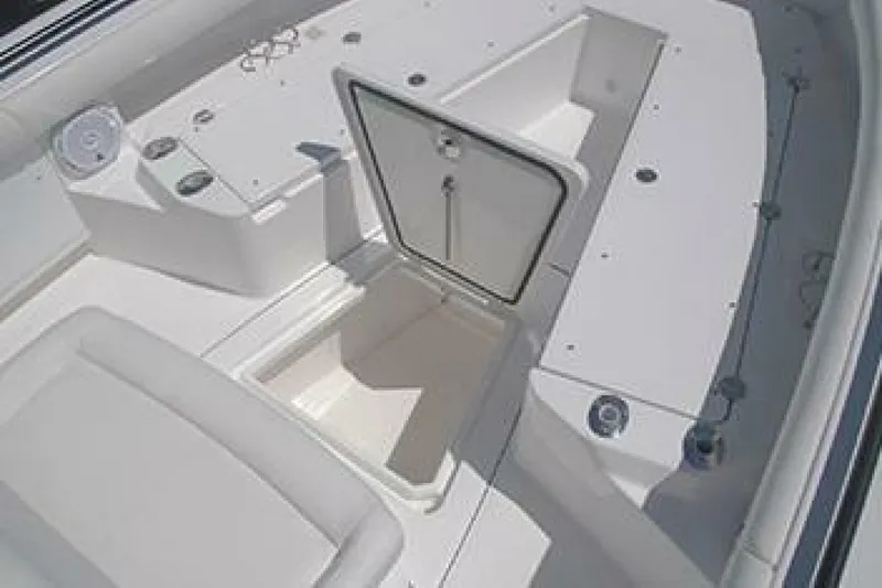 Slide: The Image of 2019 Everglades 273 Center Console boat interior with storage compartments. - 26