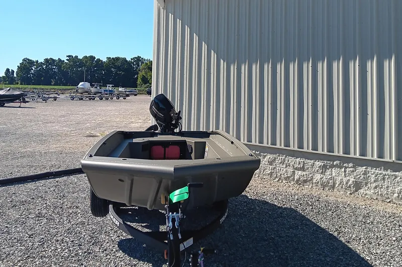 Slide: The Image of 2026 Tracker Grizzly 1650 T Prairie Wings Edition boat with Mercury 25 outboard motor. - 3