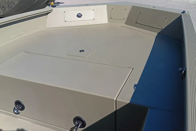 Slide: The Image of 2026 Tracker Grizzly 1650 T Prairie Wings Edition boat on trailer, outdoor setting. - 7