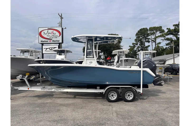 The Image of 2026 Tidewater 210 LXF boat on trailer at Marker 17 Marine dealership. - 0