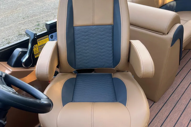 Slide: The Image of Luxurious captain's chair in 2025 Bentley Pontoons 220/223 Elite Admiral boat. - 18