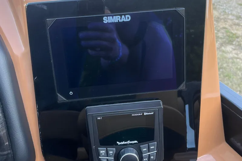 Slide: The Image of Simrad display and Rockford Fosgate audio system on 2025 Bentley Pontoons 220/223 Elite Admiral. - 21