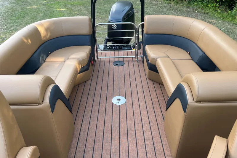 Slide: The Image of 2025 Bentley Pontoons 220/223 Elite Admiral interior with luxurious seating and stylish flooring. - 24