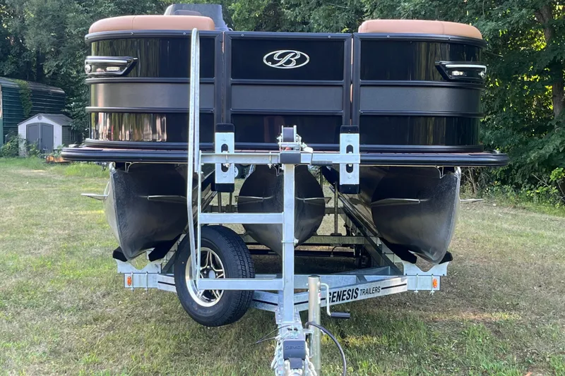 Slide: The Image of 2025 Bentley Pontoons 220/223 Elite Admiral on trailer, parked on grass. - 3