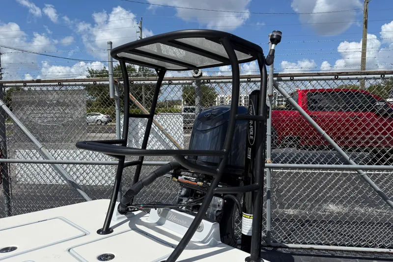 Slide: The Image of 2026 Maverick 17HPX-S boat with a sturdy T-top and powerful engine. - 12