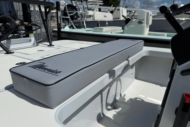 Slide: The Image of 2026 Maverick 17HPX-S boat interior with cushioned seating and sleek design. - 5