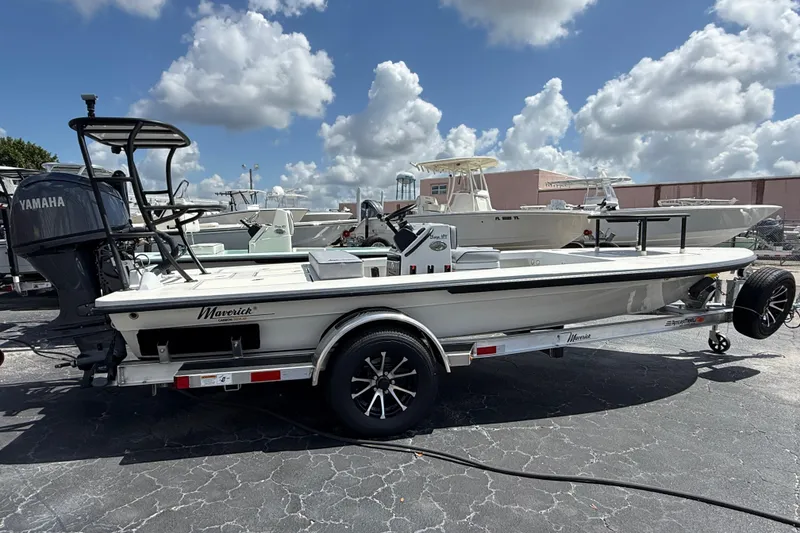 Slide: The Image of 2026 Maverick 17HPX-S boat on trailer, featuring Yamaha engine, under a partly cloudy sky. - 9