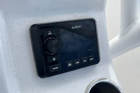Slide: The Image of Audison audio control panel on 2023 Sea Pro 199 Deep V Center Console boat. - 7