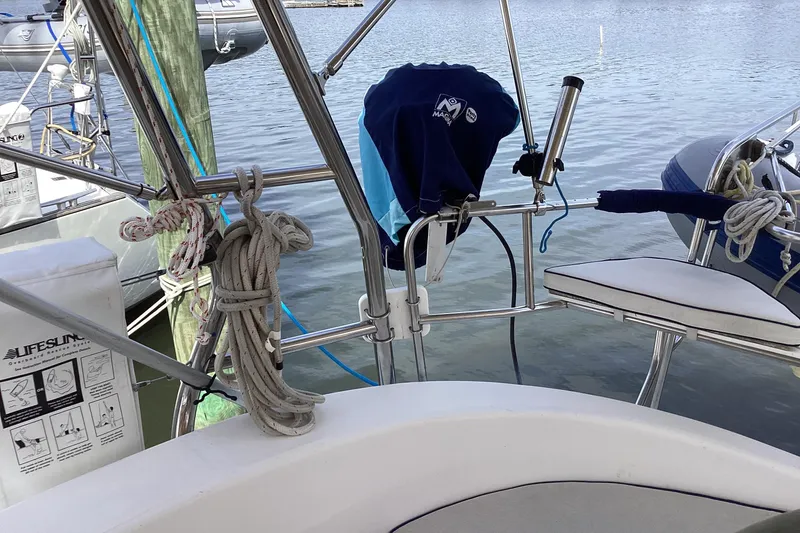 Slide: The Image of Cockpit of 2001 Hunter 380 sailboat with ropes and safety equipment. - 16